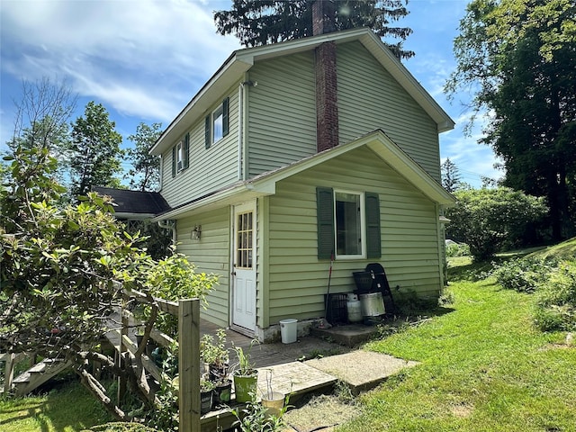 16 Upper Ferndale Rd, Liberty, NY 12754 - view of side of home with a lawn