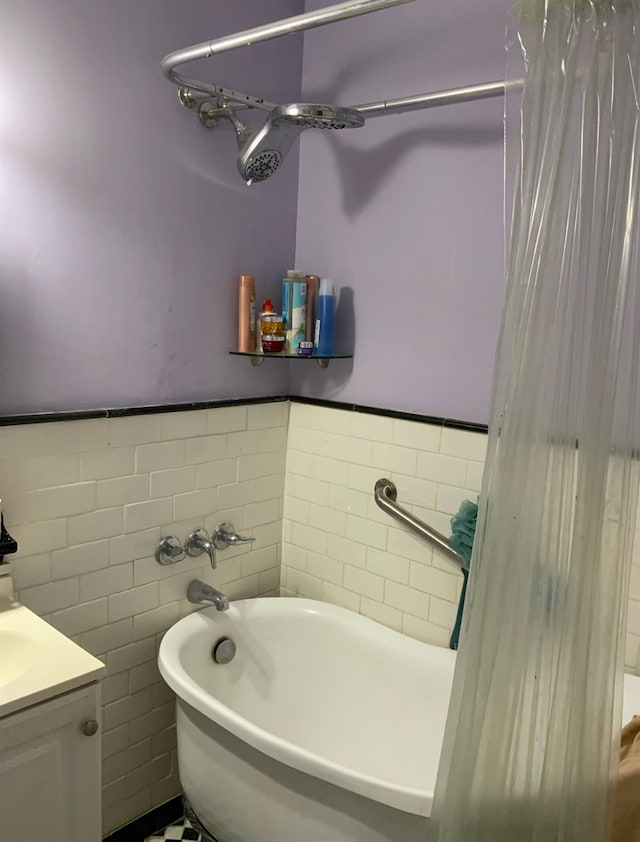 2261 Palmer Ave Unit 2A, New Rochelle, NY 10801 - full bathroom featuring a bath, tile walls, and vanity