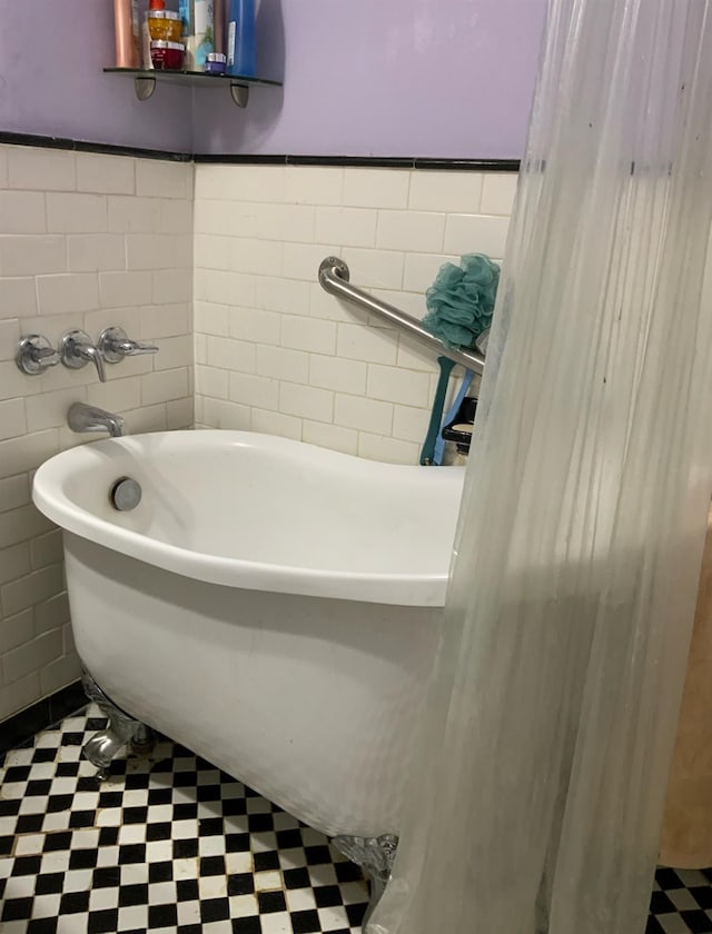 2261 Palmer Ave Unit 2A, New Rochelle, NY 10801 - full bath featuring a soaking tub, tile walls, and tile patterned floors
