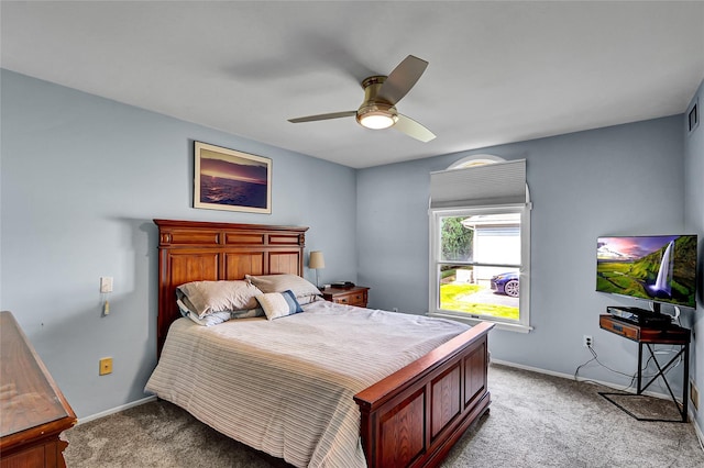 49 Primrose Ln, North Babylon, NY 11703 - bedroom featuring light carpet and a ceiling fan