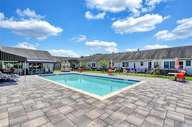 49 Primrose Ln, North Babylon, NY 11703 - community pool with a patio