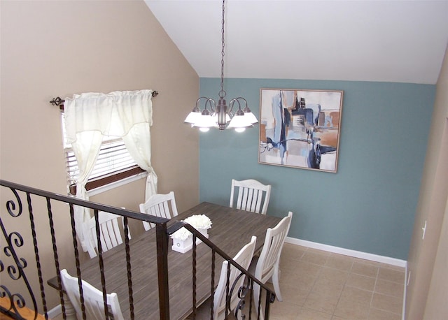 13 Lark Dr, Centereach, NY 11720 - dining space featuring lofted ceiling, a chandelier, and tile patterned floors