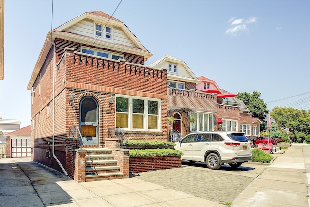 8507 Union Tpke, Glendale, NY 11385 - view of front of home featuring brick siding and driveway