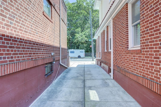 8507 Union Tpke, Glendale, NY 11385 - view of side of home with brick siding