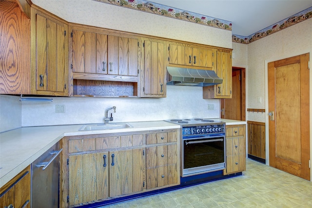 8507 Union Tpke, Glendale, NY 11385 - kitchen featuring under cabinet range hood, electric stove, light countertops, and brown cabinets