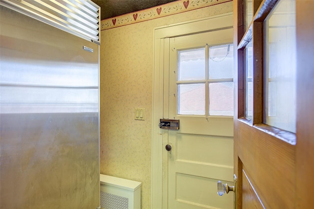 8507 Union Tpke, Glendale, NY 11385 - doorway with wallpapered walls