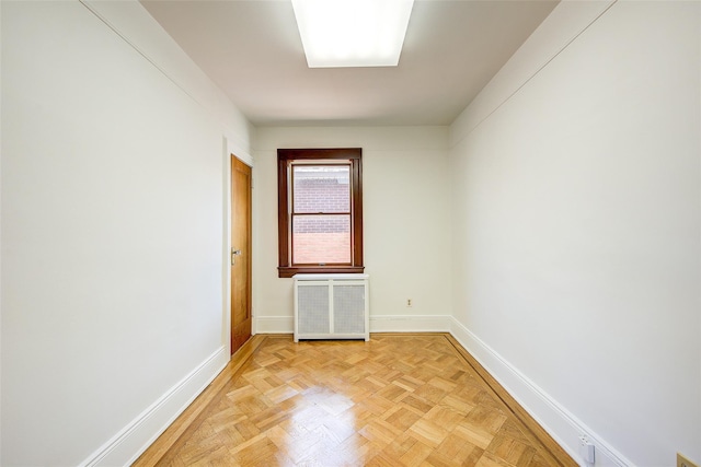 8507 Union Tpke, Glendale, NY 11385 - spare room with radiator and baseboards