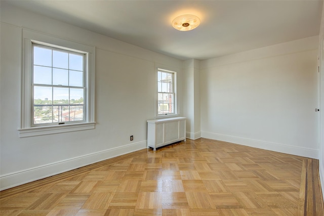 8507 Union Tpke, Glendale, NY 11385 - empty room with radiator and baseboards