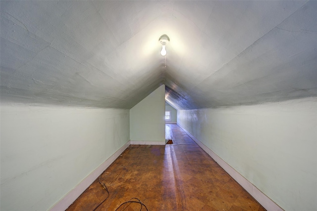 8507 Union Tpke, Glendale, NY 11385 - additional living space with lofted ceiling and baseboards