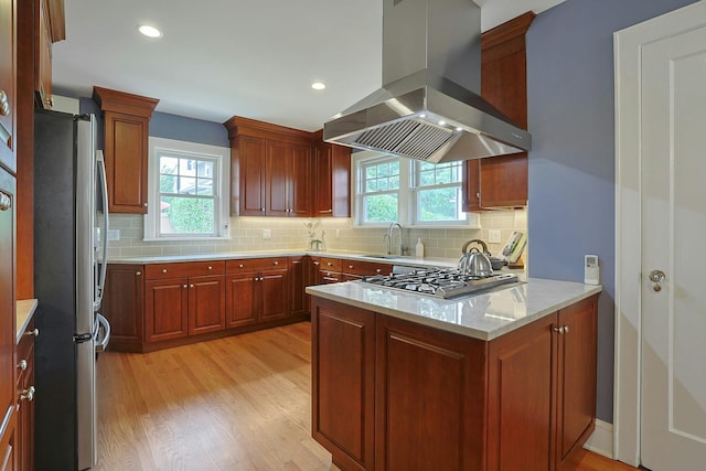 48 Faneuil Pl, New Rochelle, NY 10801 - kitchen with exhaust hood, appliances with stainless steel finishes, healthy amount of natural light, a peninsula, and recessed lighting
