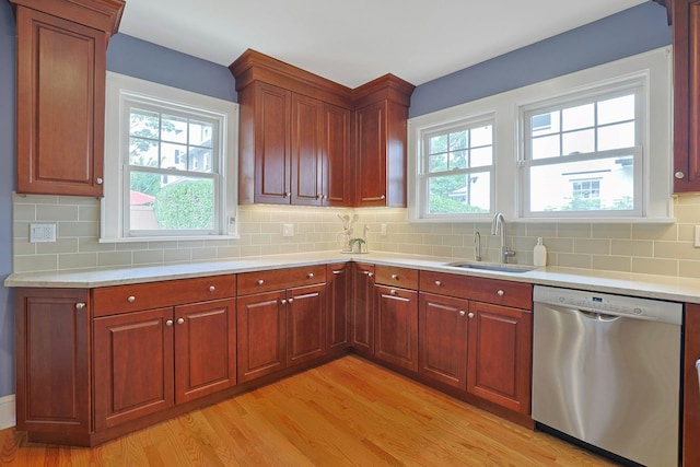 48 Faneuil Pl, New Rochelle, NY 10801 - kitchen featuring dishwasher, light wood-style floors, and light countertops