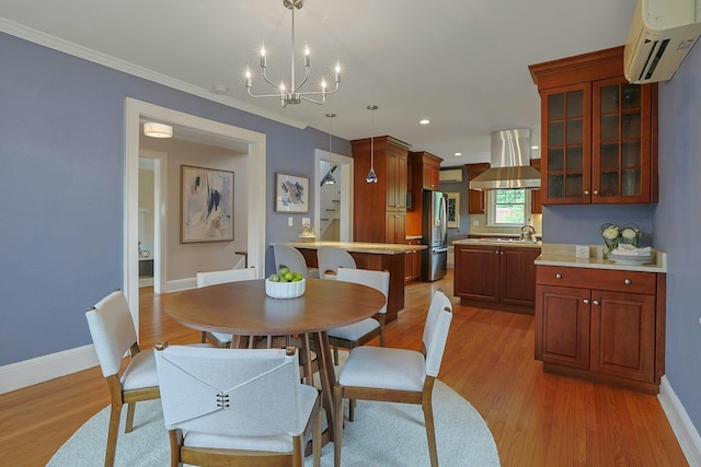 48 Faneuil Pl, New Rochelle, NY 10801 - dining room featuring an AC wall unit, a chandelier, light wood-style flooring, crown molding, and recessed lighting