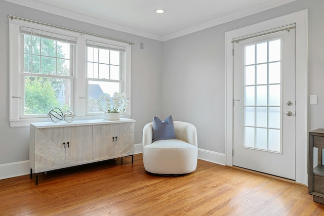 48 Faneuil Pl, New Rochelle, NY 10801 - sitting room featuring healthy amount of natural light, light wood-type flooring, crown molding, and recessed lighting