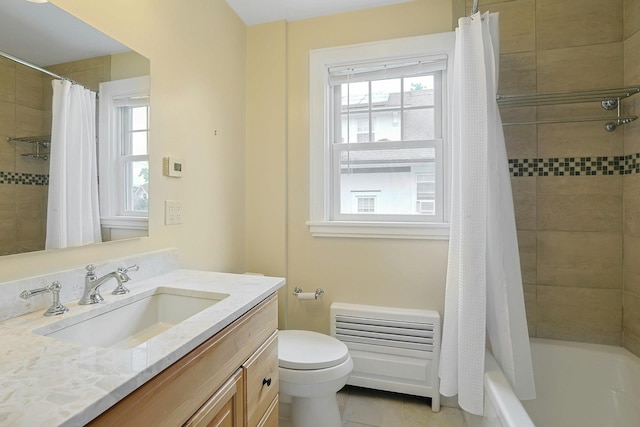 48 Faneuil Pl, New Rochelle, NY 10801 - full bath featuring vanity, healthy amount of natural light, shower / tub combo with curtain, and tile patterned flooring