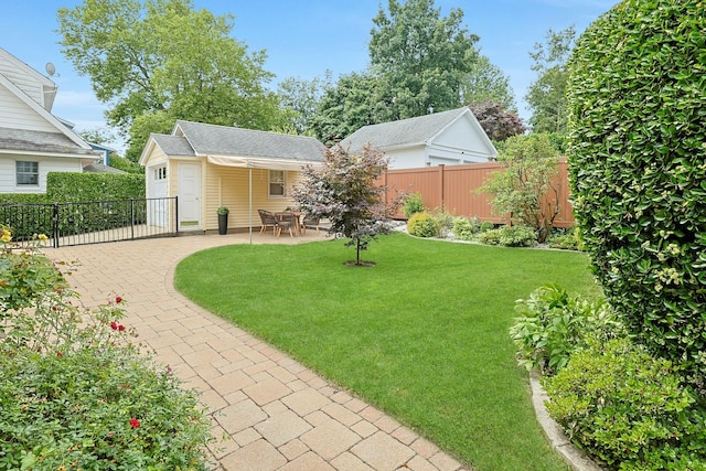48 Faneuil Pl, New Rochelle, NY 10801 - view of yard featuring a patio and an outbuilding