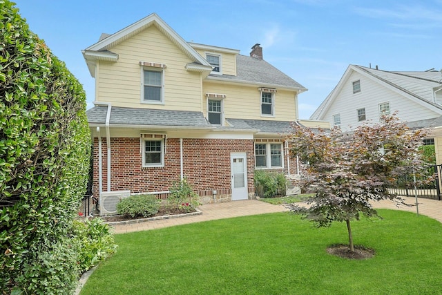 48 Faneuil Pl, New Rochelle, NY 10801 - rear view of house with a chimney, roof with shingles, and brick siding
