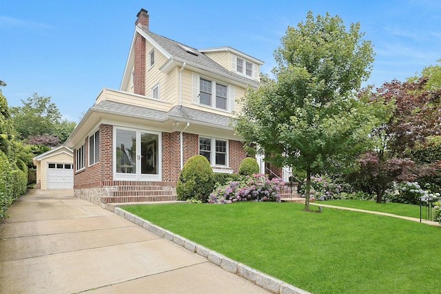 48 Faneuil Pl, New Rochelle, NY 10801 - view of front of property featuring a chimney, an outdoor structure, a garage, a front yard, and brick siding