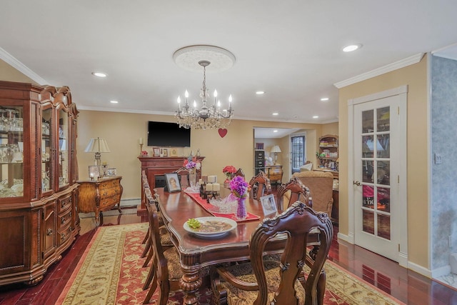 10 Harrison St, Brentwood, NY 11717 - dining room featuring dark wood-type flooring, crown molding, a chandelier, recessed lighting, and a baseboard heating unit