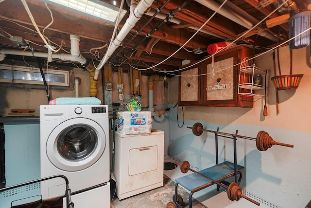 10 Harrison St, Brentwood, NY 11717 - unfinished below grade area featuring washer and clothes dryer