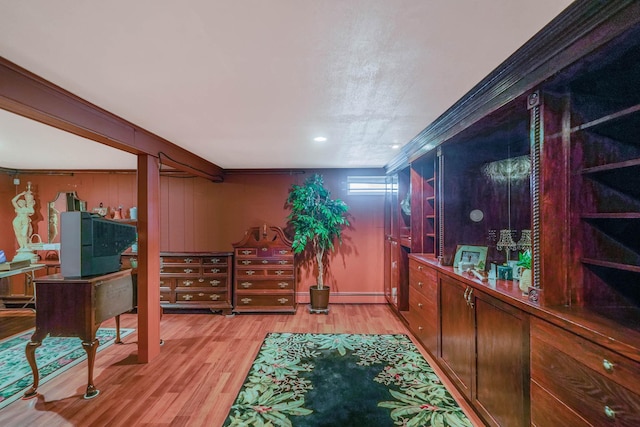 10 Harrison St, Brentwood, NY 11717 - hallway with light wood-type flooring and a baseboard heating unit