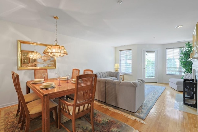 23 Bridge Ln Unit 23, Haverstraw, NY 10927 - dining room with light wood finished floors, a chandelier, and recessed lighting
