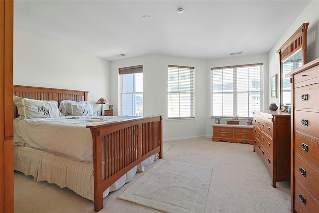 23 Bridge Ln Unit 23, Haverstraw, NY 10927 - bedroom with light colored carpet and multiple windows