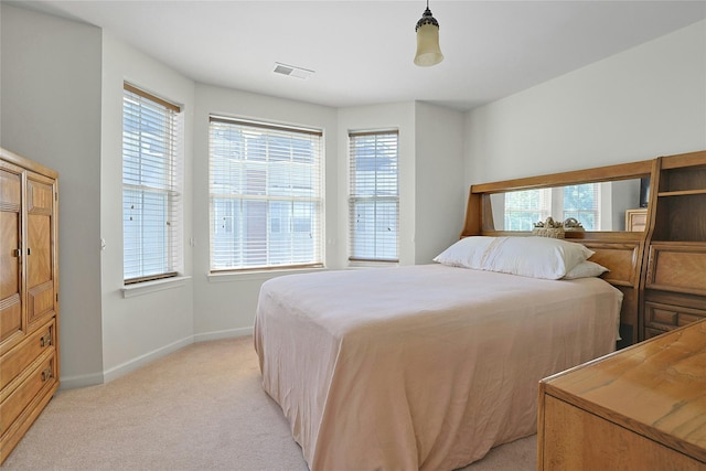 23 Bridge Ln Unit 23, Haverstraw, NY 10927 - bedroom featuring baseboards and light carpet