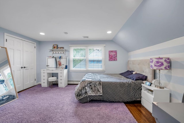 14 Ridge Dr E, Roslyn, NY 11576 - bedroom featuring a baseboard radiator, lofted ceiling, recessed lighting, and a closet