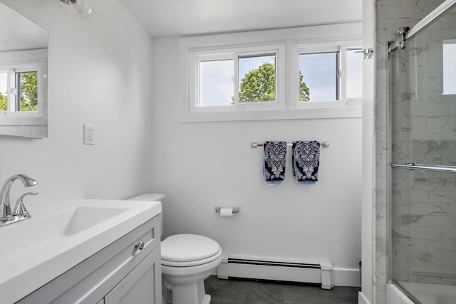 14 Ridge Dr E, Roslyn, NY 11576 - bathroom with baseboard heating, vanity, and combined bath / shower with glass door