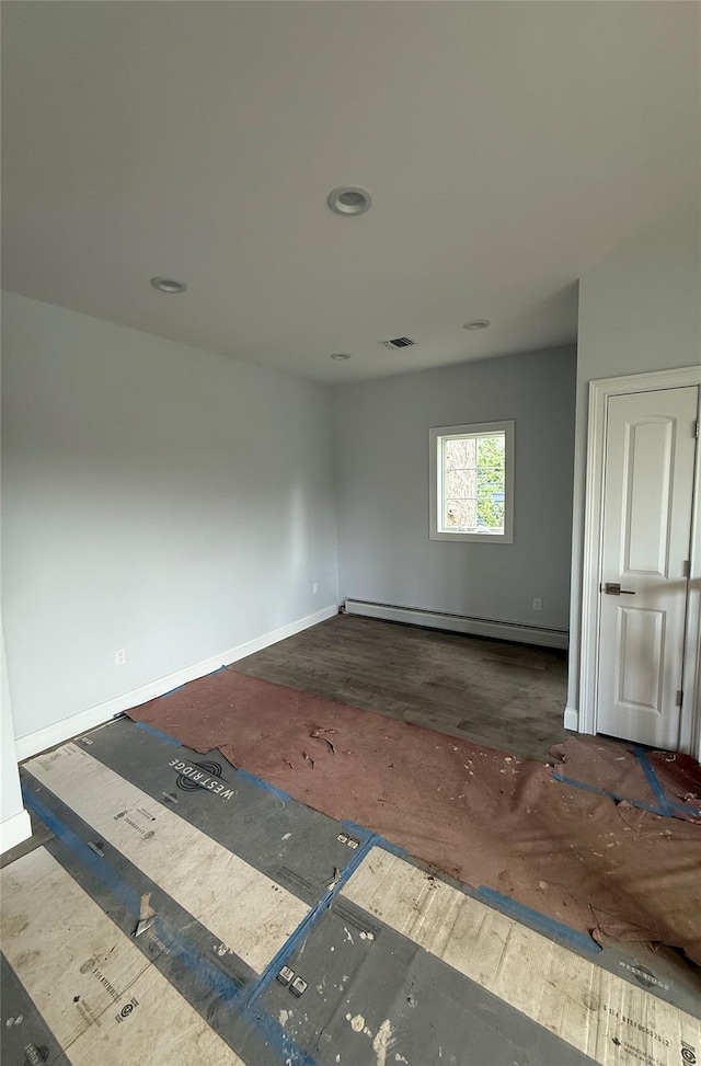 47 Sheridan Ave, Congers, NY 10920 - empty room with a baseboard heating unit and baseboards