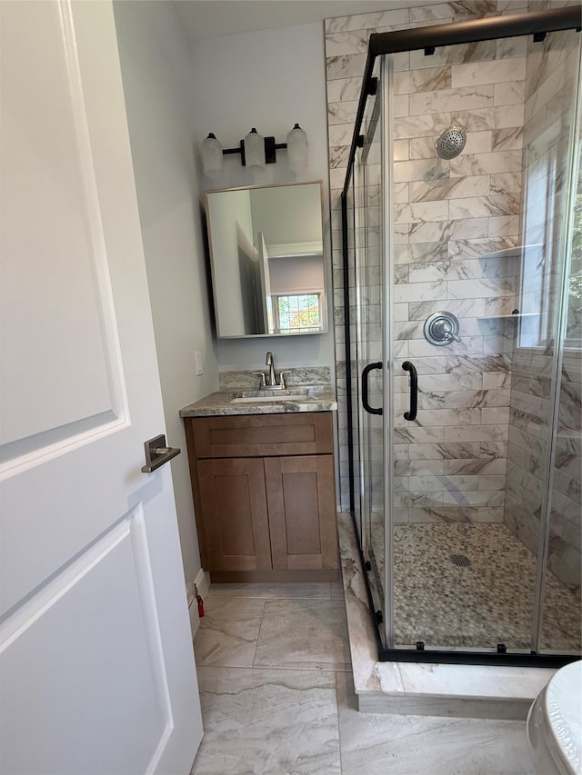 47 Sheridan Ave, Congers, NY 10920 - full bathroom featuring marble look tile flooring, vanity, and a stall shower