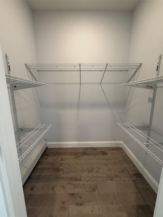 47 Sheridan Ave, Congers, NY 10920 - spacious closet with wood-type flooring and baseboard heating