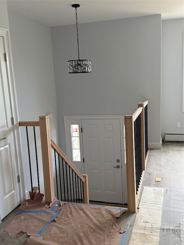 47 Sheridan Ave, Congers, NY 10920 - entrance foyer featuring a baseboard radiator and a chandelier