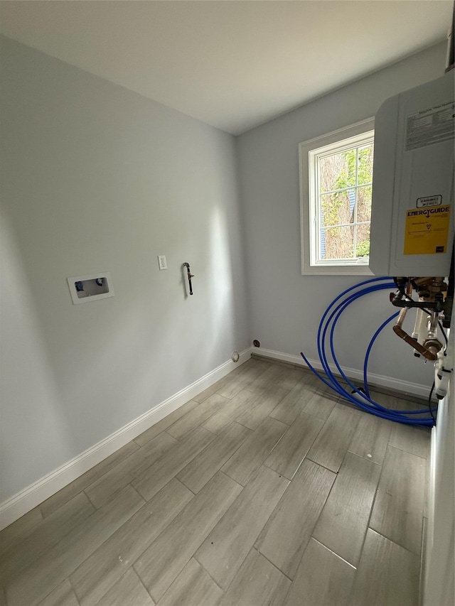 47 Sheridan Ave, Congers, NY 10920 - laundry room featuring washer hookup and wood finish floors