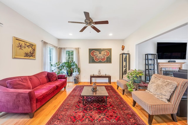 212A Lower Sheep Pasture Rd, East Setauket, NY 11733 - living area featuring ceiling fan, light wood-type flooring, recessed lighting, and a fireplace