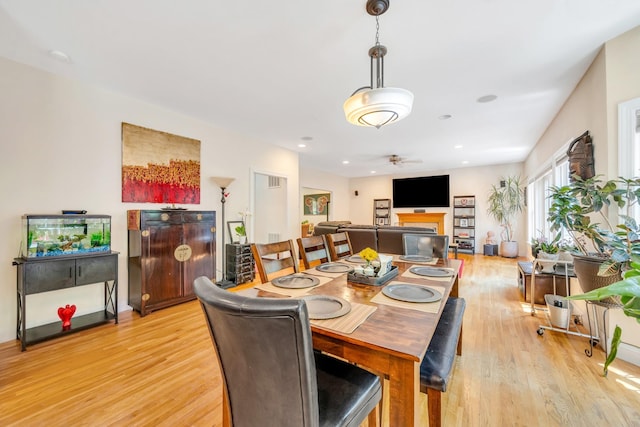 212A Lower Sheep Pasture Rd, East Setauket, NY 11733 - dining room featuring light wood-style flooring, a ceiling fan, and recessed lighting