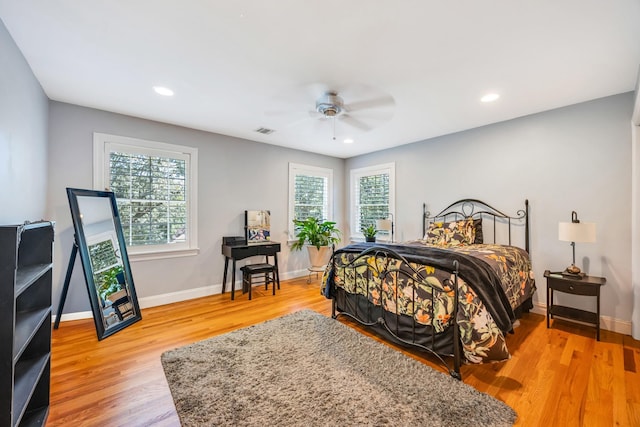 212A Lower Sheep Pasture Rd, East Setauket, NY 11733 - bedroom with wood finished floors, recessed lighting, and a ceiling fan