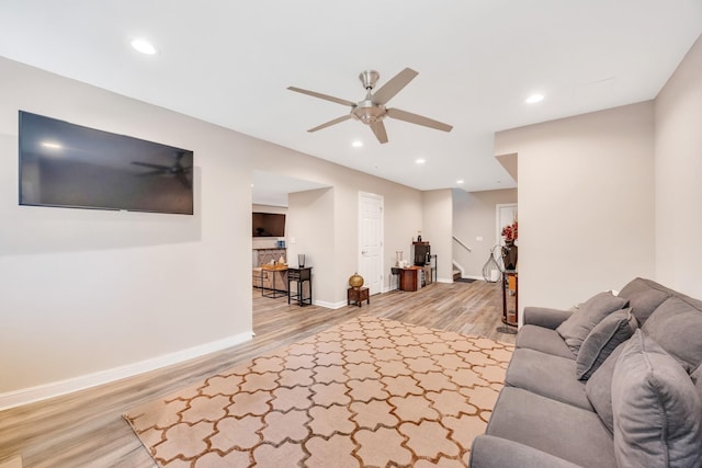 212A Lower Sheep Pasture Rd, East Setauket, NY 11733 - living area featuring stairway, a ceiling fan, light wood-style floors, and recessed lighting