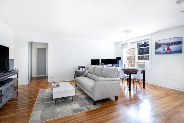 105-25 67th Rd Unit 5G, Forest Hills, NY 11375 - living area featuring wood finished floors and cooling unit