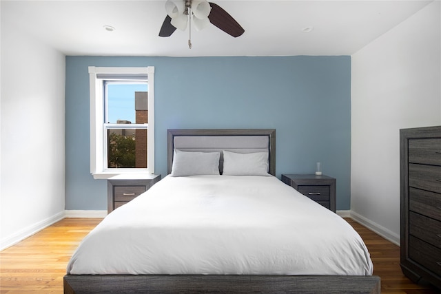 105-25 67th Rd Unit 5G, Forest Hills, NY 11375 - bedroom with wood finished floors and ceiling fan