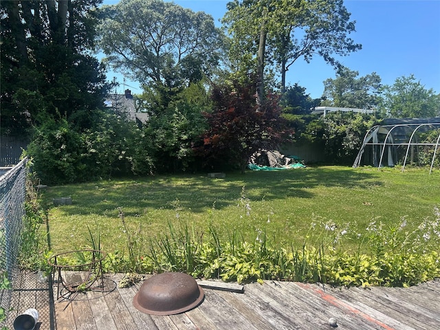 14 Eastwood Dr, North Babylon, NY 11703 - view of grassy yard with a wooden deck