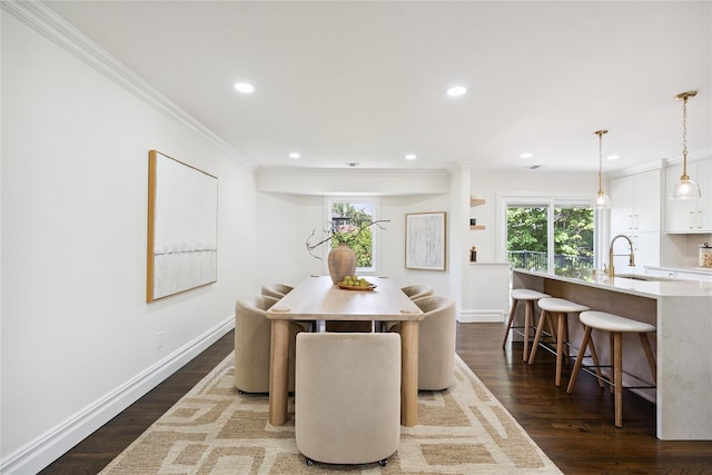 43 Acorn Ln, Plainview, NY 11803 - dining area featuring crown molding, healthy amount of natural light, recessed lighting, and dark wood finished floors
