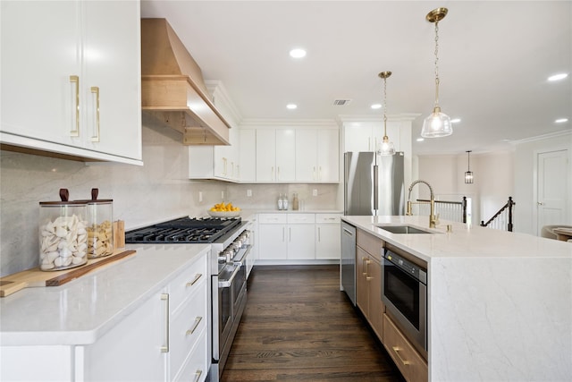 43 Acorn Ln, Plainview, NY 11803 - kitchen featuring appliances with stainless steel finishes, custom range hood, decorative backsplash, decorative light fixtures, and white cabinets