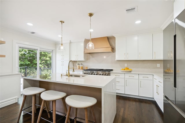 43 Acorn Ln, Plainview, NY 11803 - kitchen featuring freestanding refrigerator, custom exhaust hood, dark wood-style flooring, light countertops, and tasteful backsplash