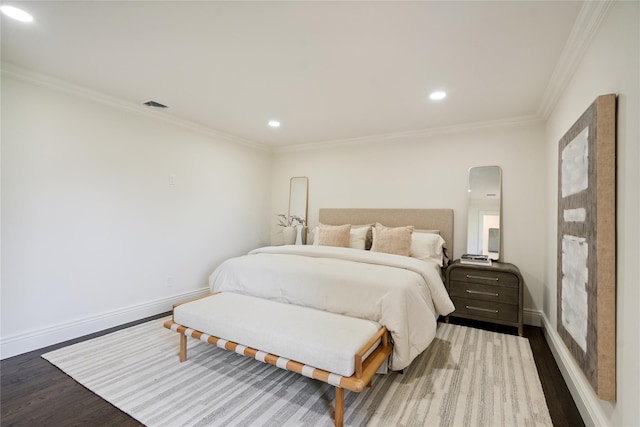43 Acorn Ln, Plainview, NY 11803 - bedroom with wood finished floors, recessed lighting, crown molding, and arched walkways