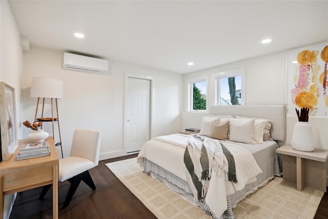 43 Acorn Ln, Plainview, NY 11803 - bedroom featuring a wall mounted AC, recessed lighting, and wood finished floors
