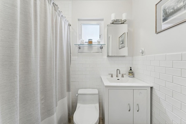 101 Connecticut Ave, Long Beach, NY 11561 - full bath with tile walls, vanity, a wainscoted wall, and curtained shower