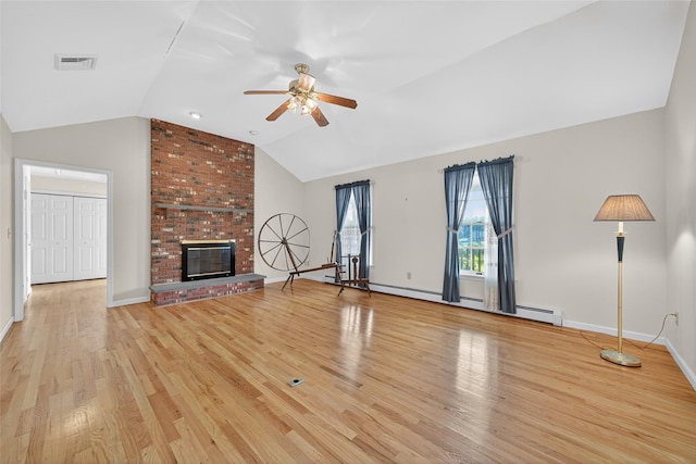 81 Hambletonian Rd, Chester, NY 10918 - unfurnished living room featuring lofted ceiling, ceiling fan, light wood-style flooring, a baseboard radiator, and a fireplace