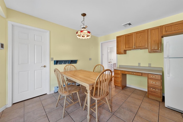 81 Hambletonian Rd, Chester, NY 10918 - dining room featuring light tile patterned floors and baseboards