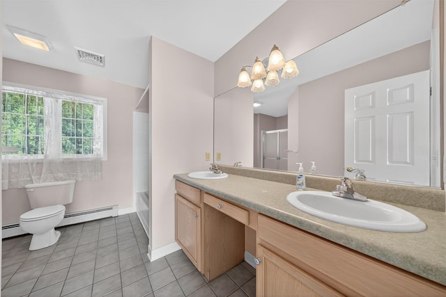 81 Hambletonian Rd, Chester, NY 10918 - bathroom with a baseboard heating unit, double vanity, tile patterned floors, and shower / tub combination
